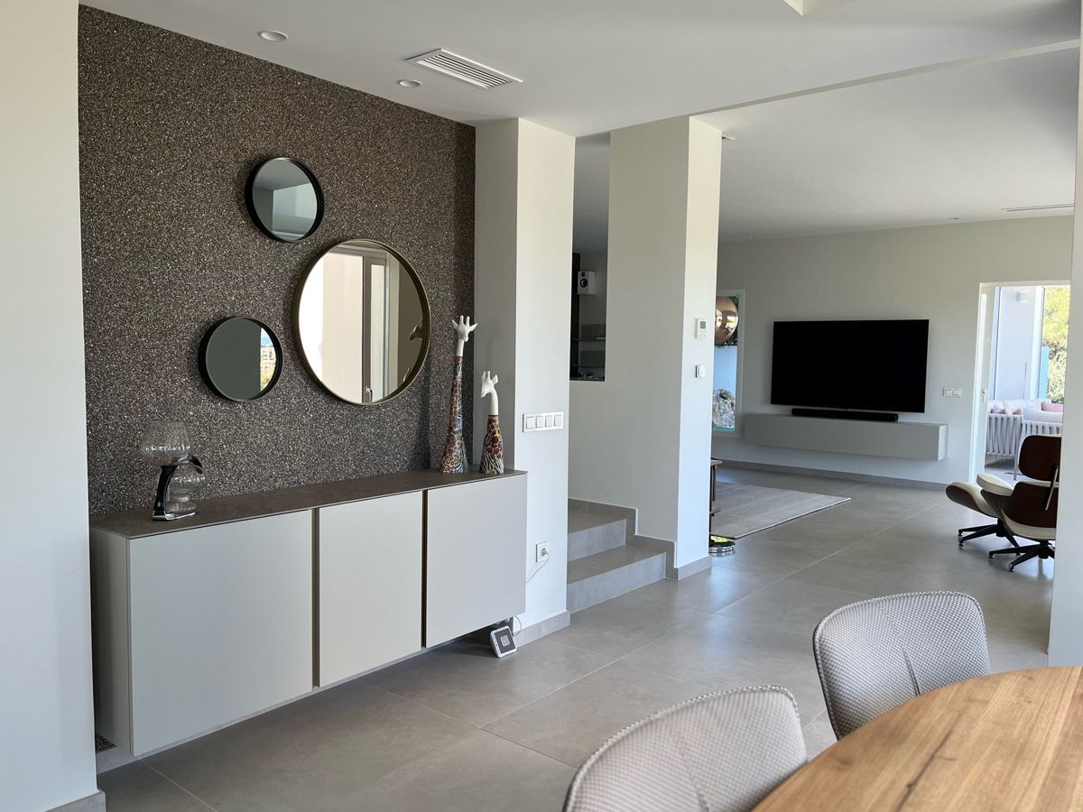 Luxury living room furniture project in a villa in Estepona by VIP Environment