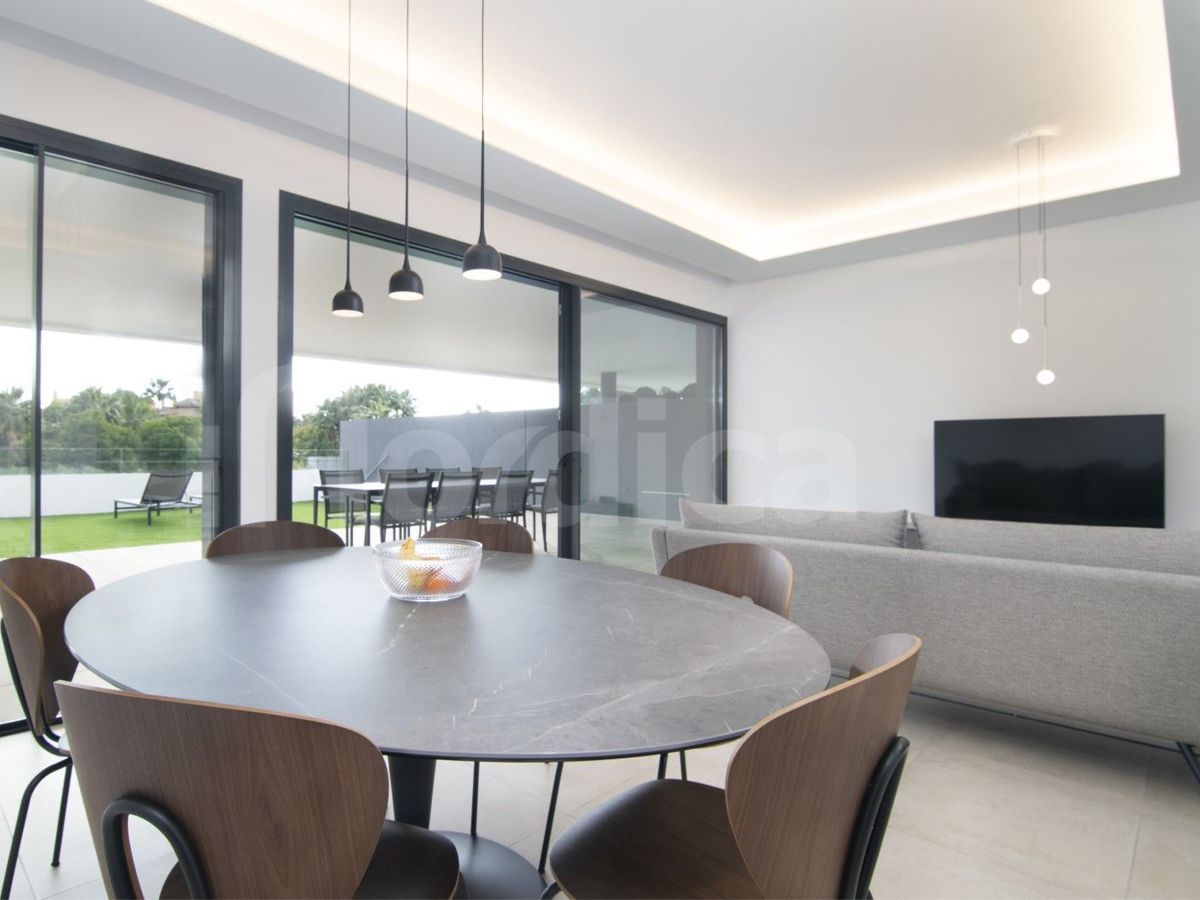 Luxury living and dining room furniture project in Estepona by VIP Environment for luxury rental