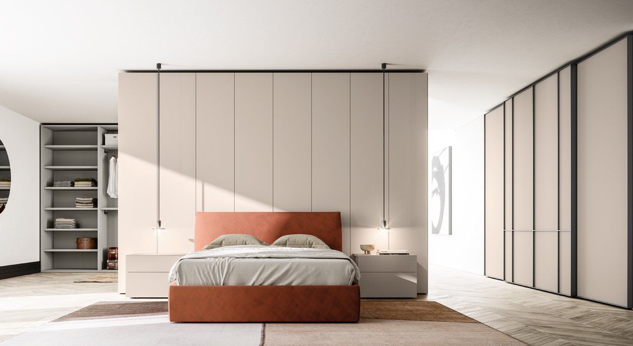 Bedroom Storage System in Lacquer with Sliding Doors and Open Shelving in Lacquer. Also available in wood and smoked glass. Bedside units are also available to match.