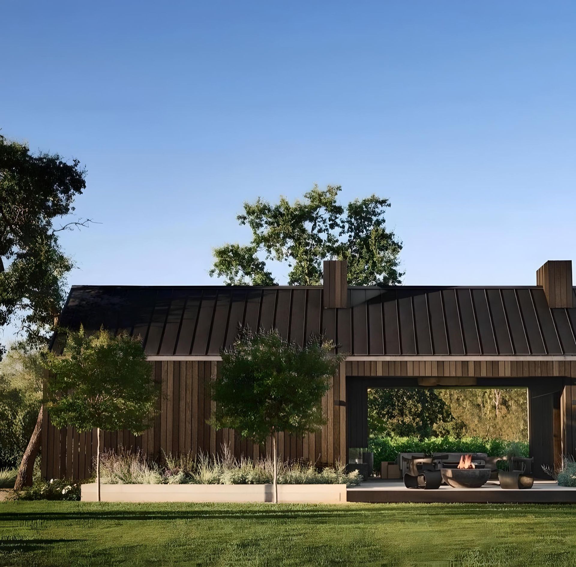 an artist 's impression of a house with a fire pit