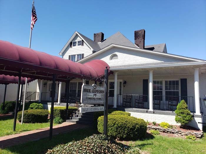 Several photos of Hux & Lipford Funeral Home In Mountain City, TN