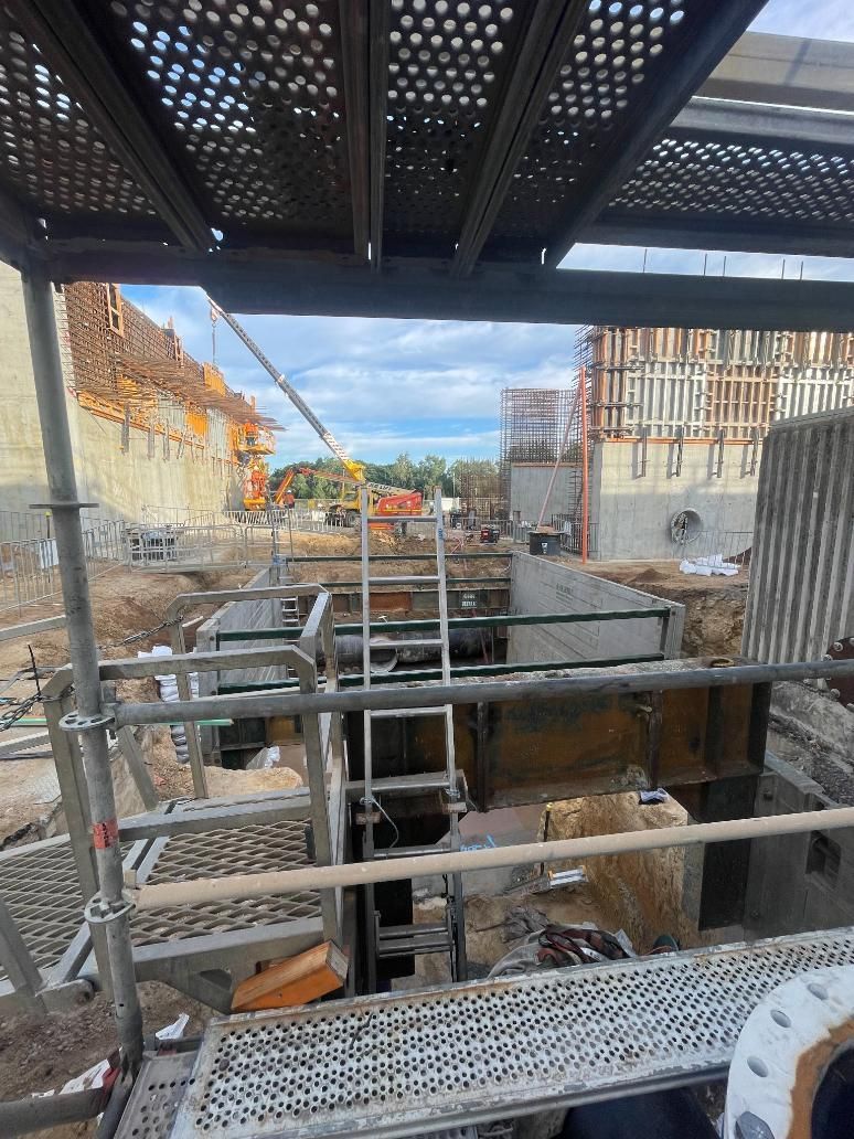 A Construction Site With Scaffolding And A Ladder — LJ's Technical Services In Hunter Valley, NSW