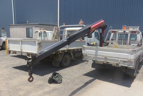 A Crane Is Attached To The Back Of A Truck — LJ's Technical Services In Burdell, QLD