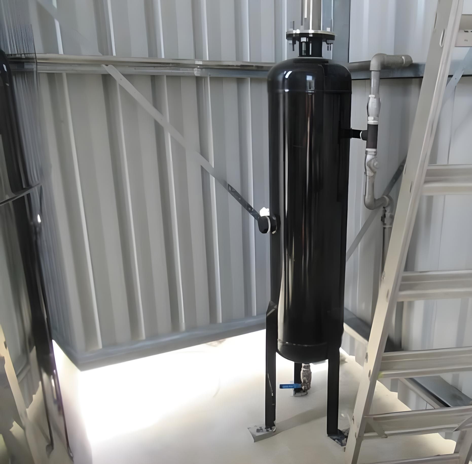 A Black Tank With A Blue Valve Is In A Room Next To A Ladder — LJ's Technical Services In Burdell, QLD