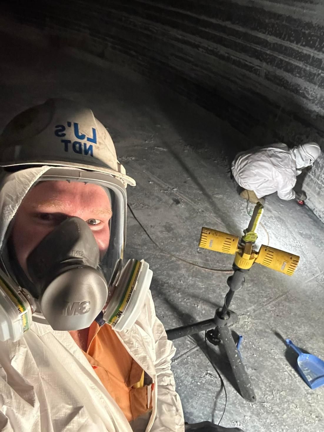 A Man Wearing A Gas Mask And A Hard Hat Is Taking A Selfie — LJ's Technical Services In South Australia, AU