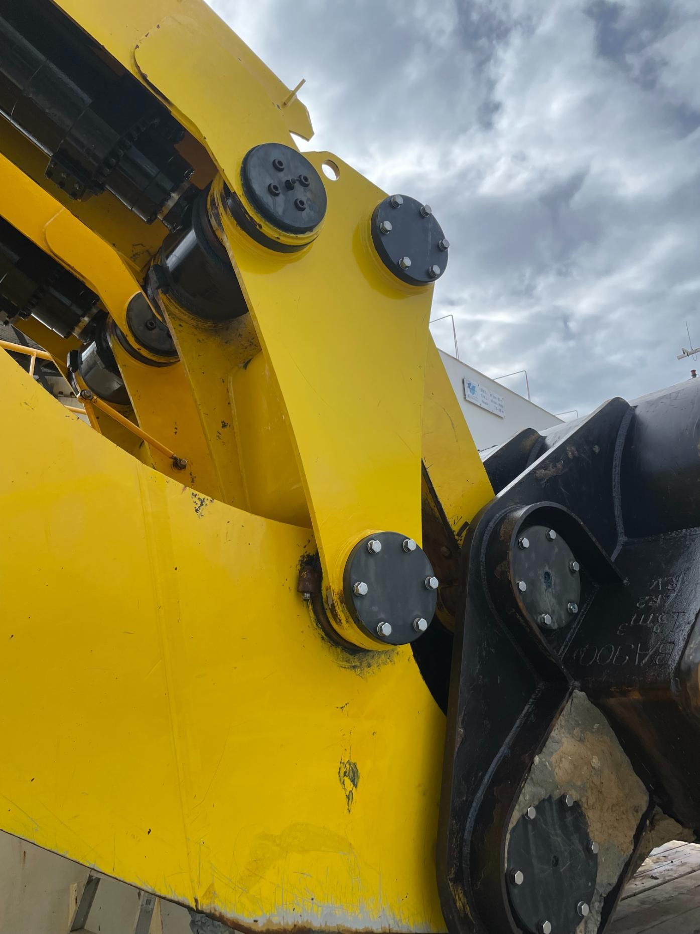 A Close Up Of A Yellow Machine With A Cloudy Sky In The Background — LJ's Technical Services In Burdell, QLD