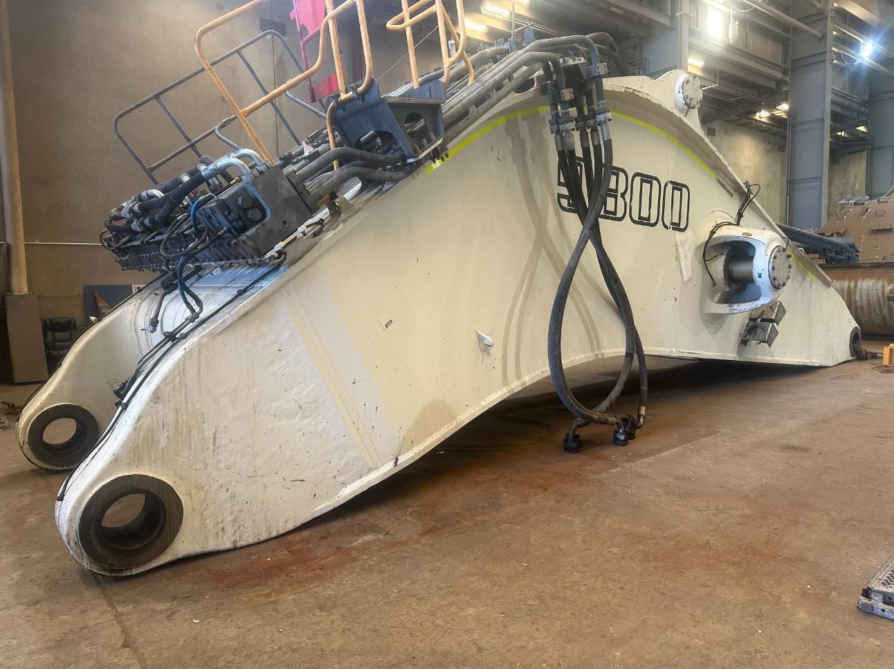 A Large Piece Of Equipment Is Sitting On The Floor In A Warehouse — LJ's Technical Services In Burdell, QLD