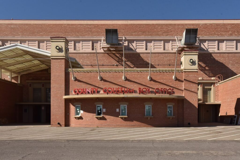 Brick building with red sign 