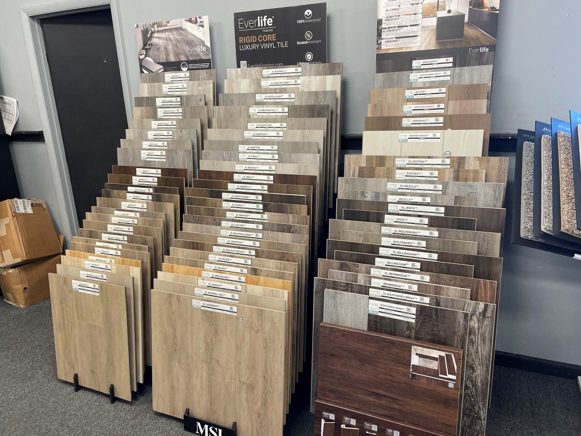 There are many different types of flooring on display in this room.