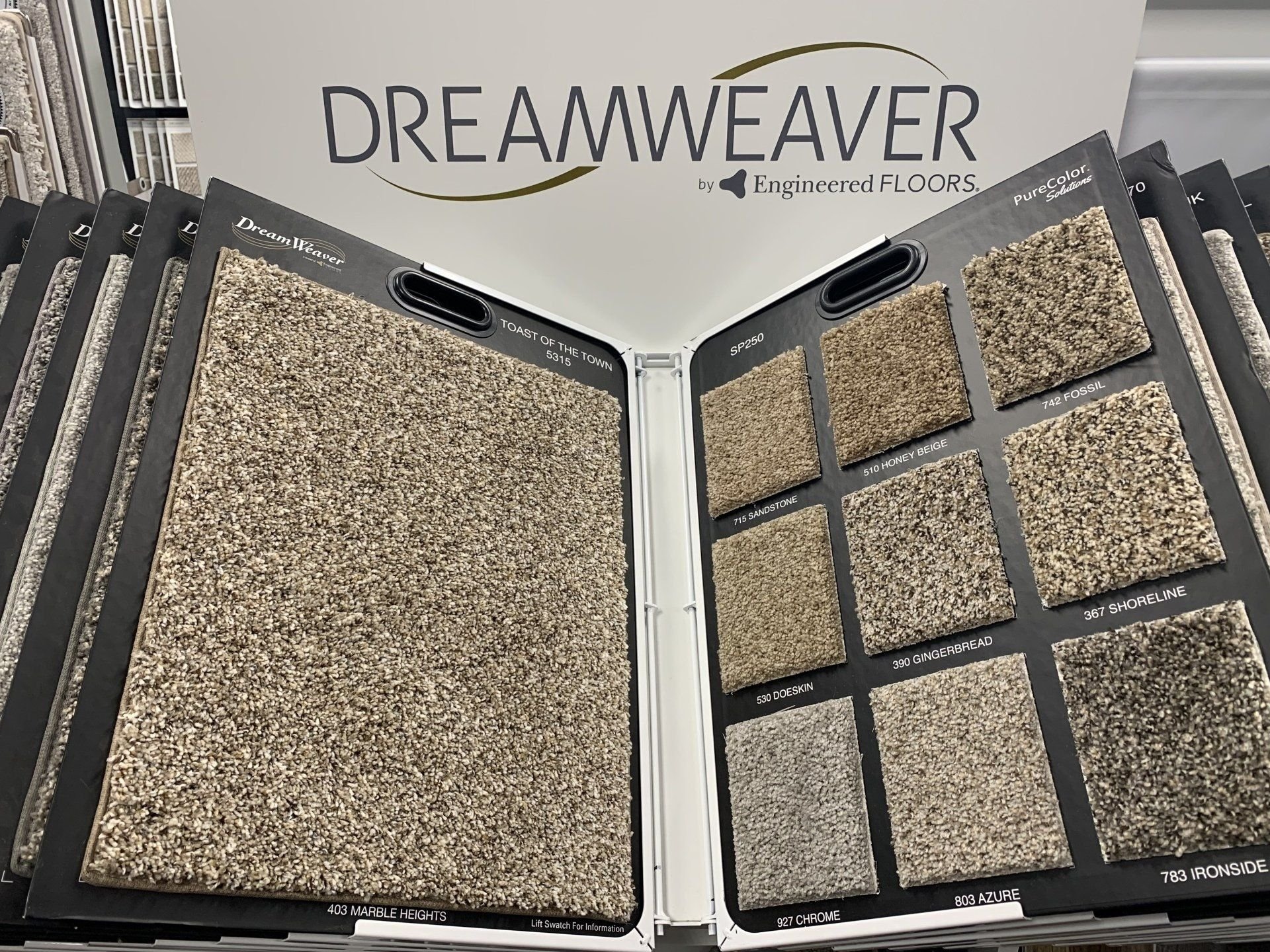 There are many different types of carpets in this display case.