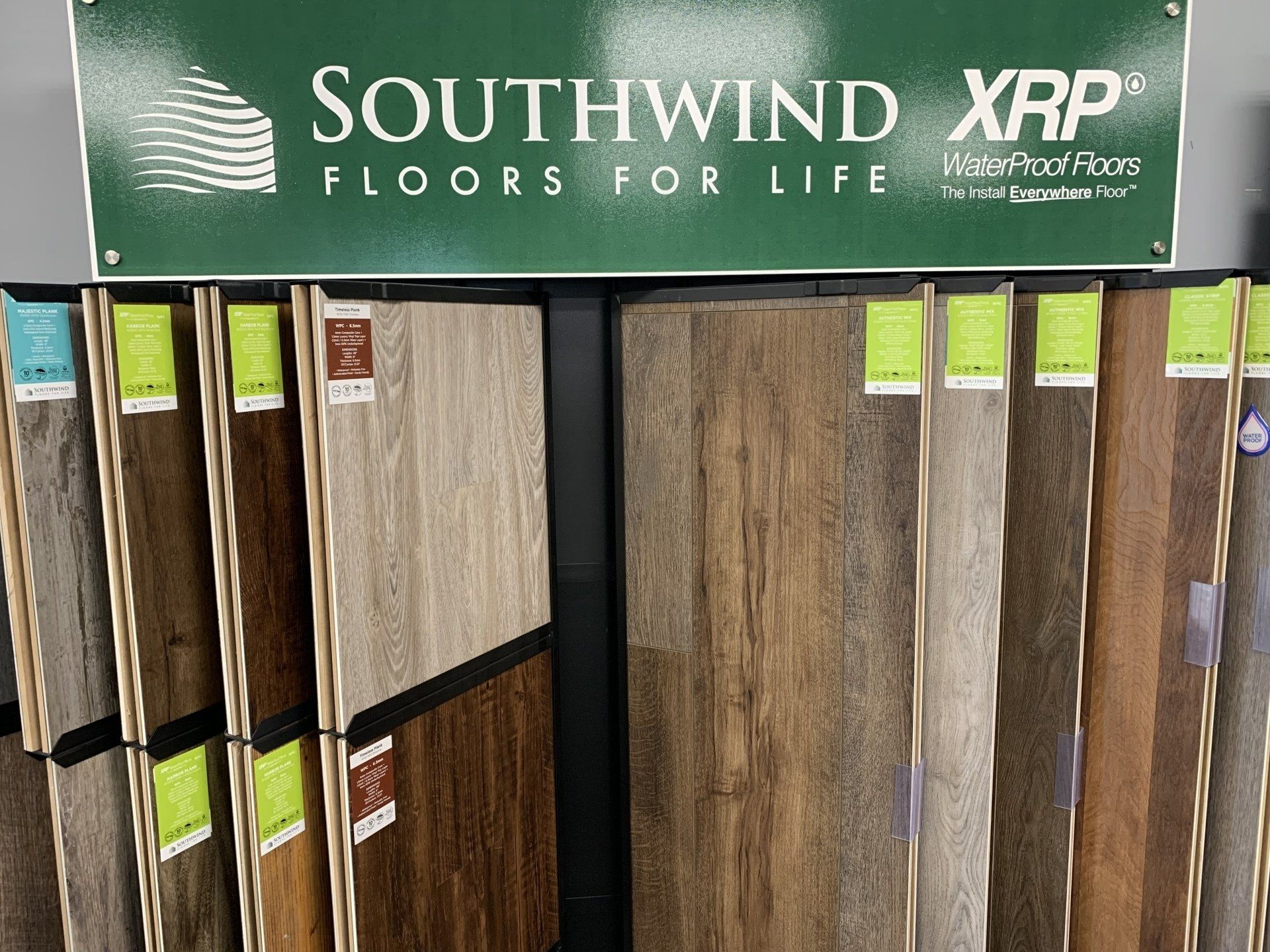 A display of southwind xrp floors for life in a store.