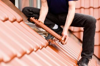 Installing Maroon Roofing Shingles — Carlsbad, NM — ENM Construction Management Ltd