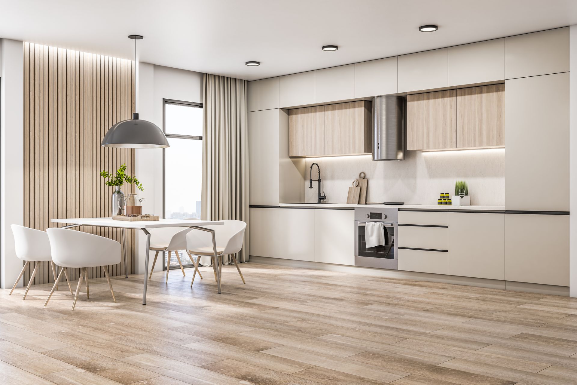 A modern, bright open-plan kitchen and dining area with light wood floors, white cabinets, and a minimalist dining set.