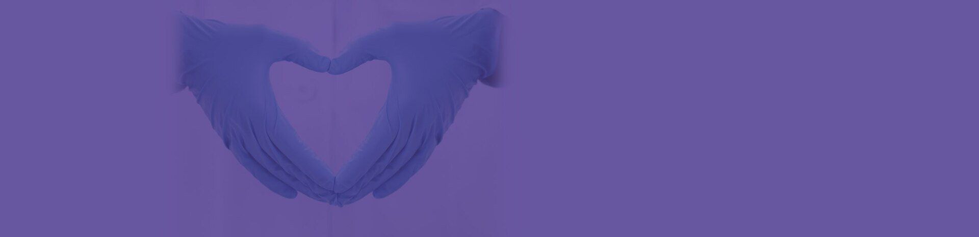 Se dibuja un corazón morado sobre un fondo morado.