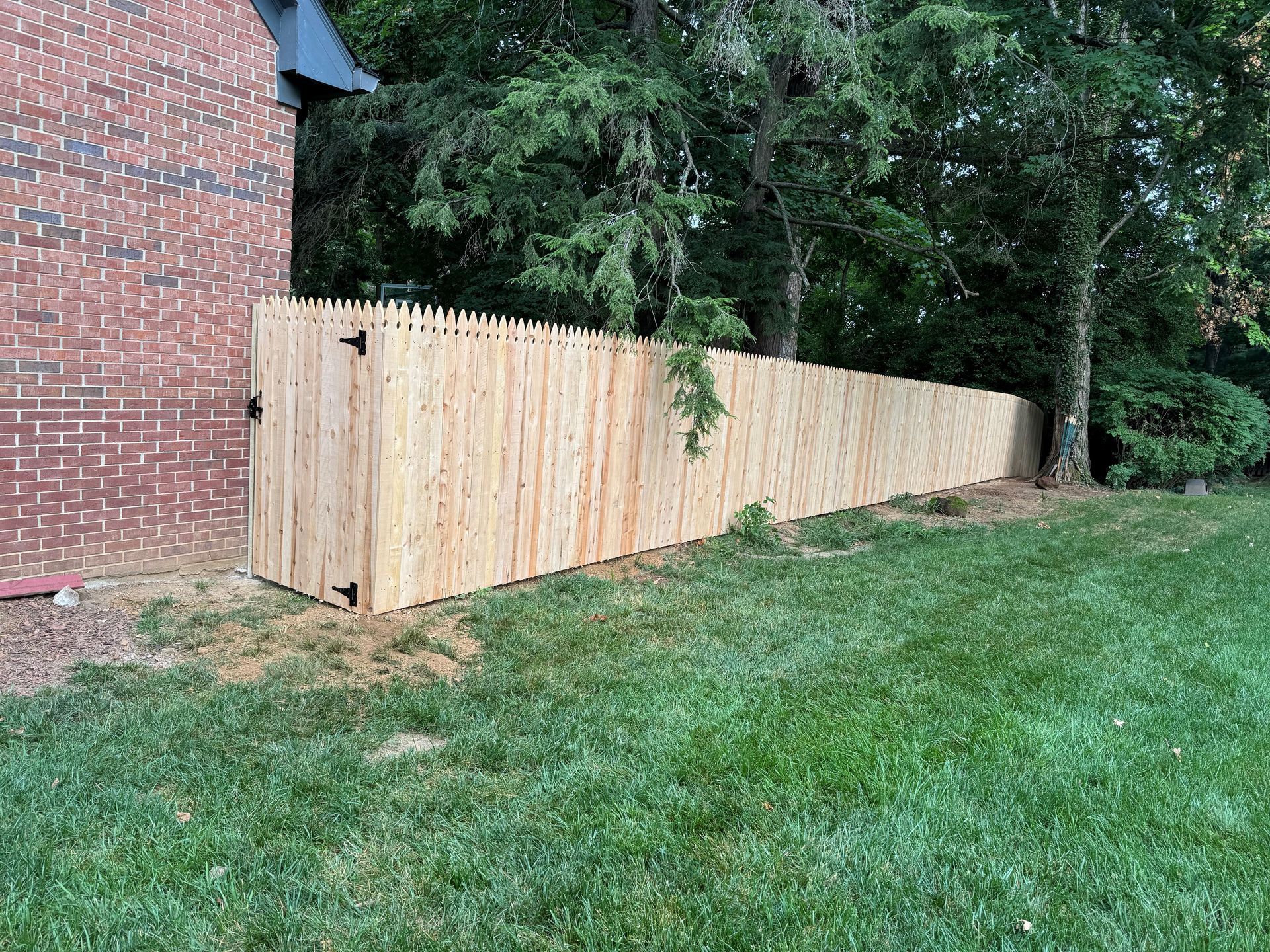 Wooden Fence in Front of Building — Louisville, KY — Shatkoff Fencing