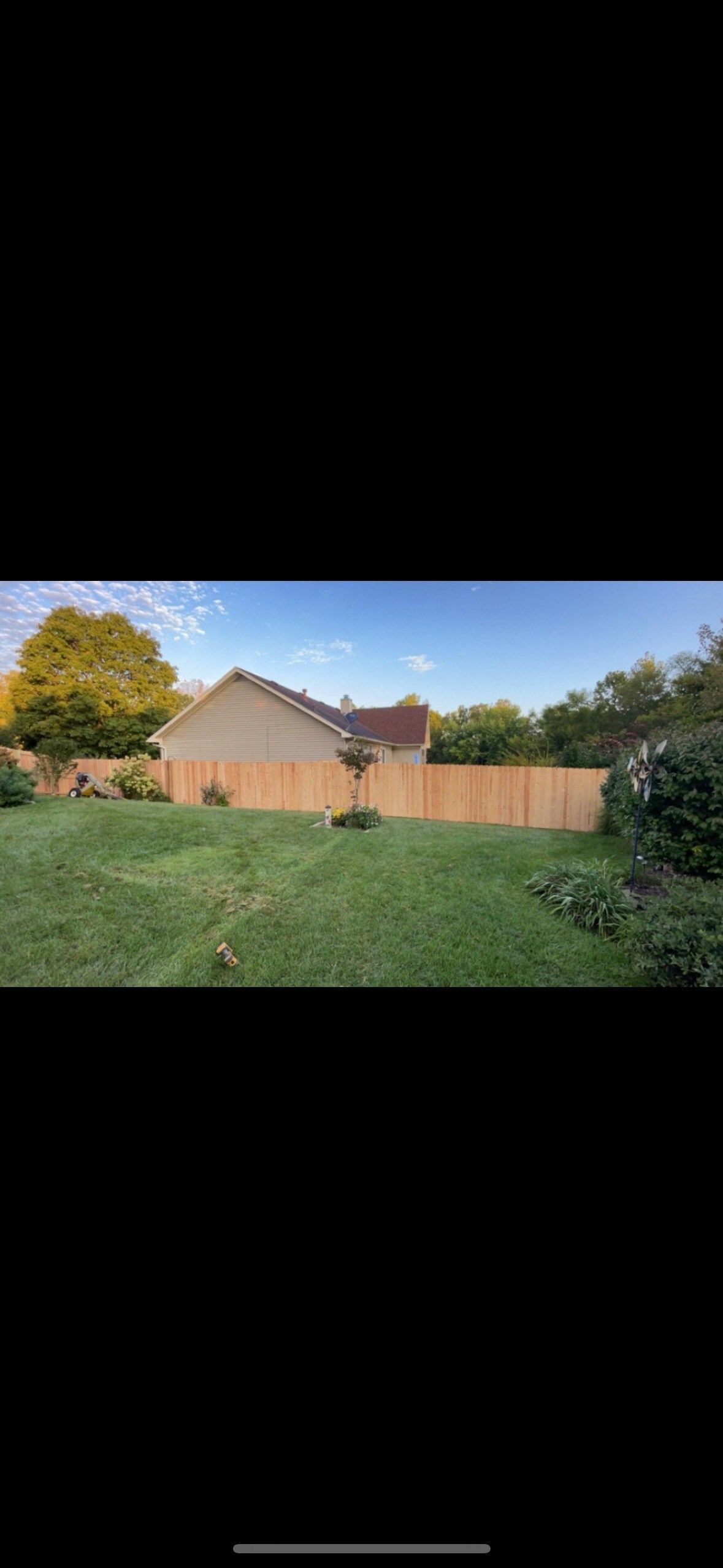 House Surrounded by Wooden Fence — Louisville, KY — Shatkoff Fencing