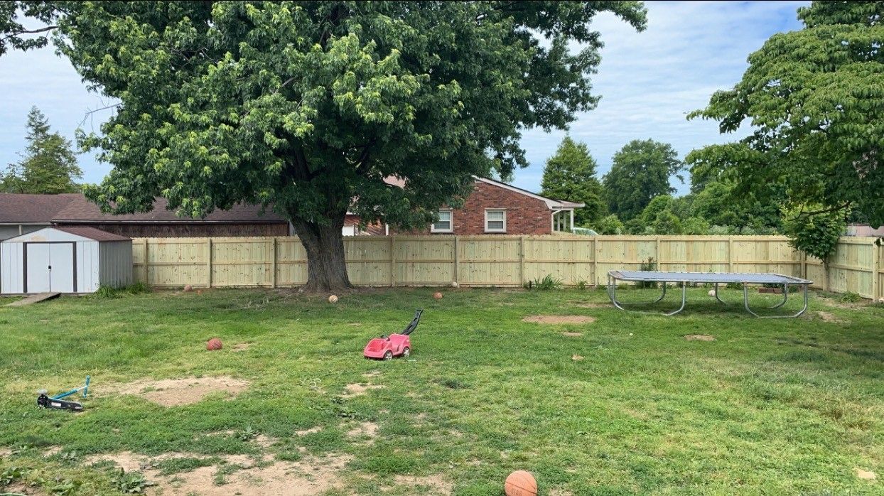Trampoline in Backyard — Louisville, KY — Shatkoff Fencing