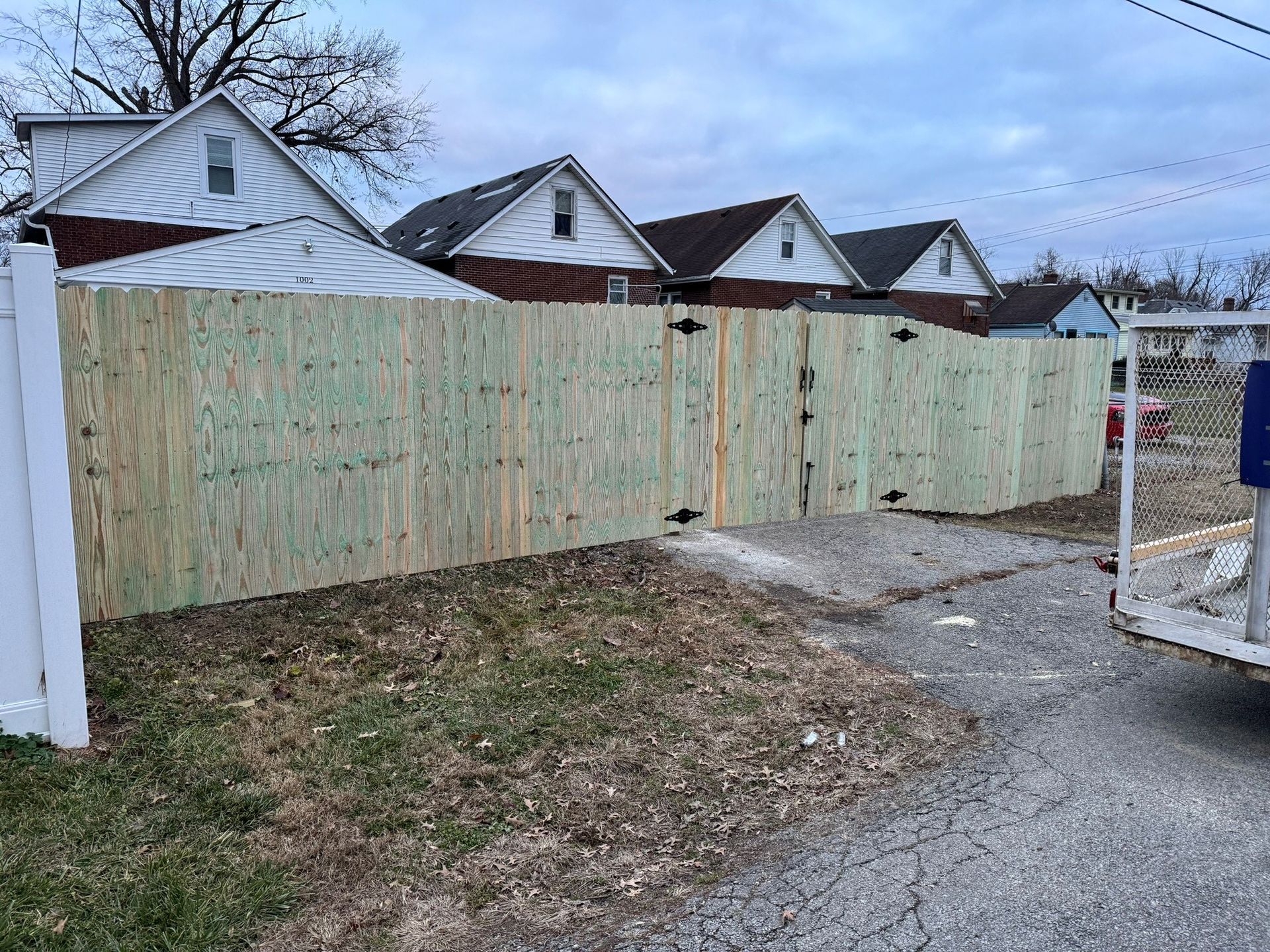 Row of Houses Wooden Fence — Louisville, KY — Shatkoff Fencing