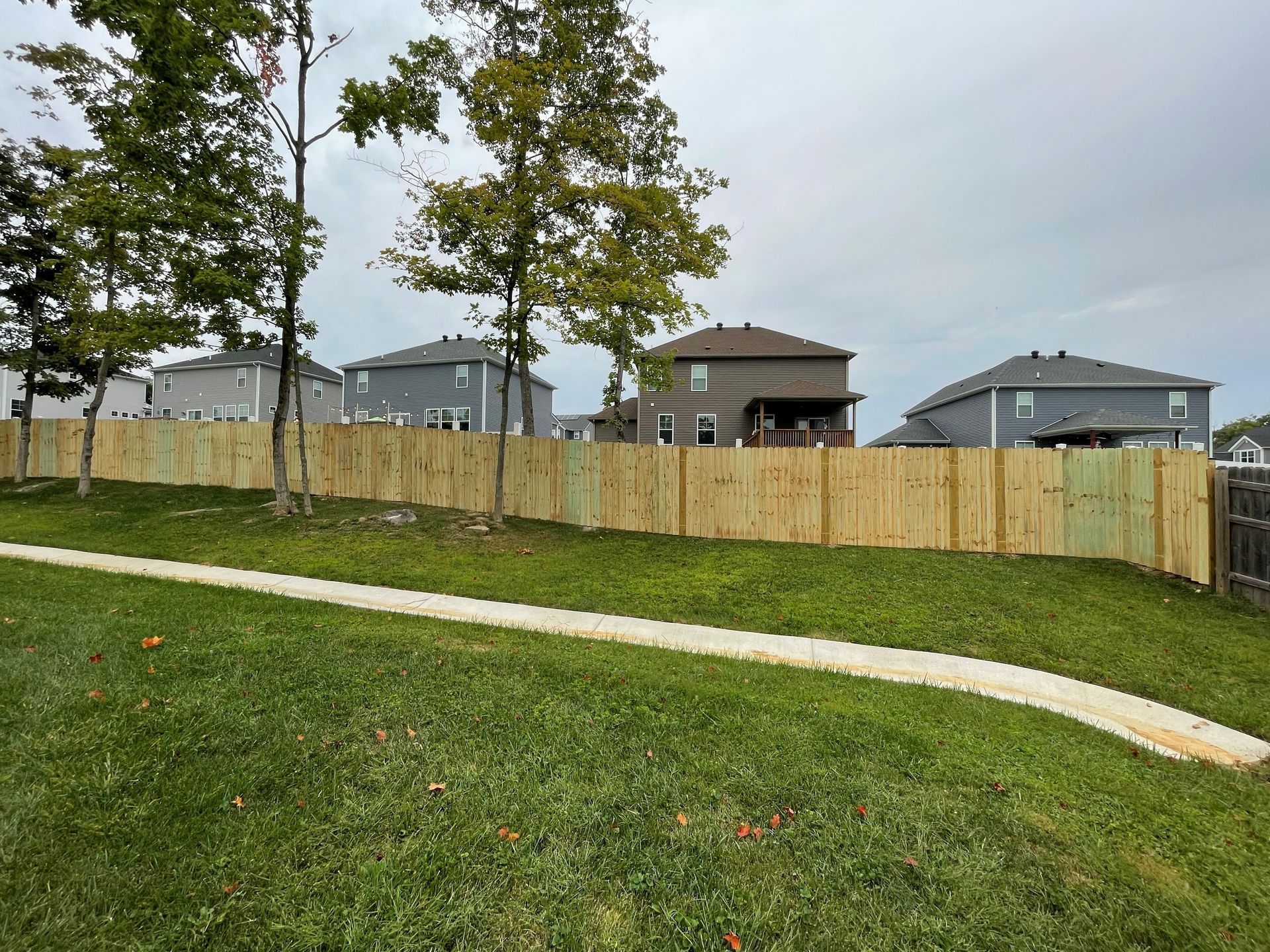 Wooden Fence Beside Pathway — Louisville, KY — Shatkoff Fencing
