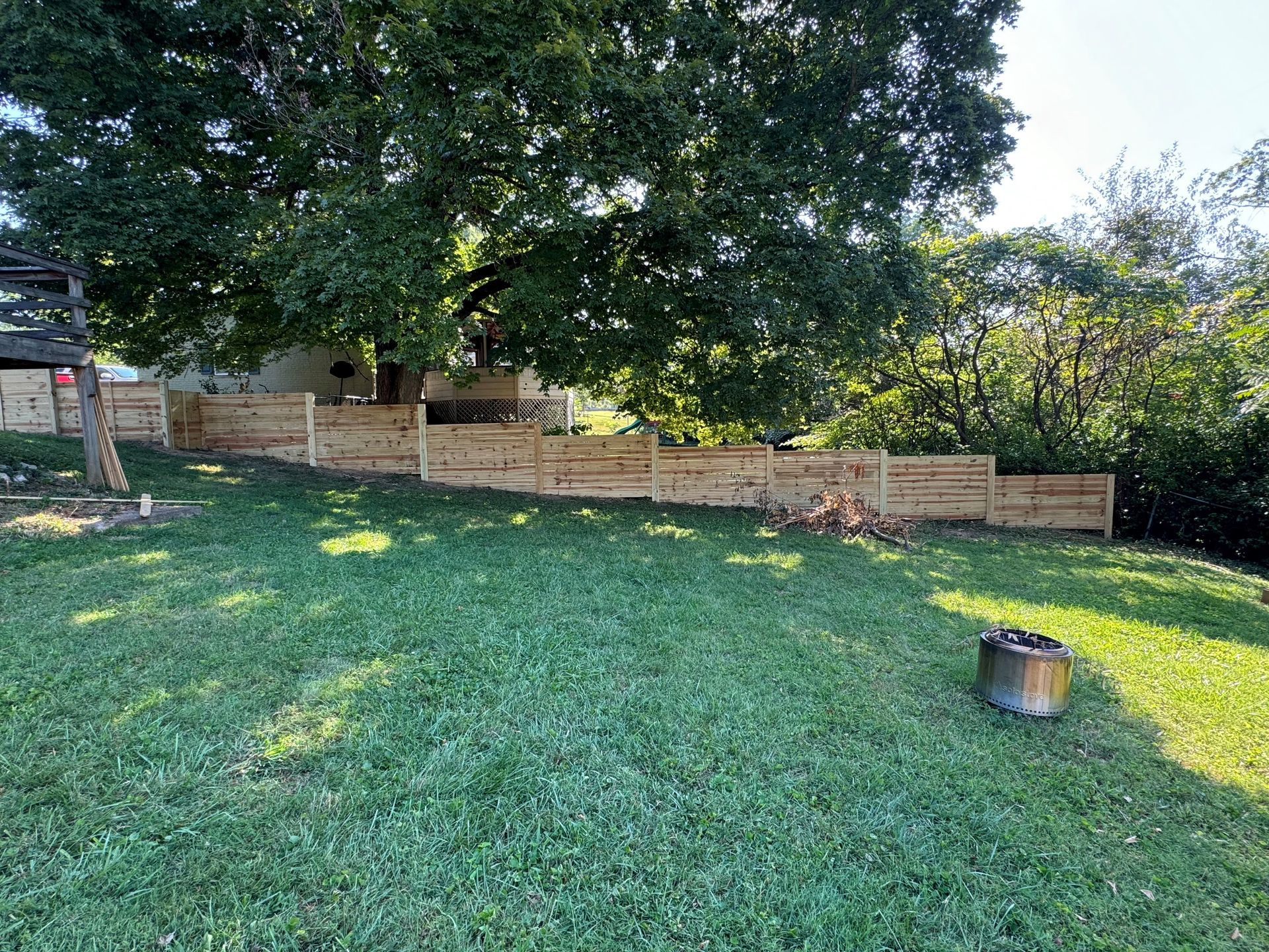 Spacious Backyard with Wooden Fence — Louisville, KY — Shatkoff Fencing