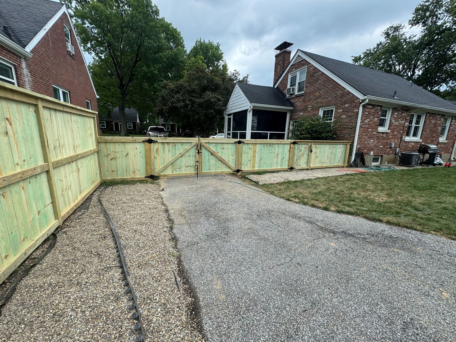 Gravel Driveway Wooden Fence — Louisville, KY — Shatkoff Fencing