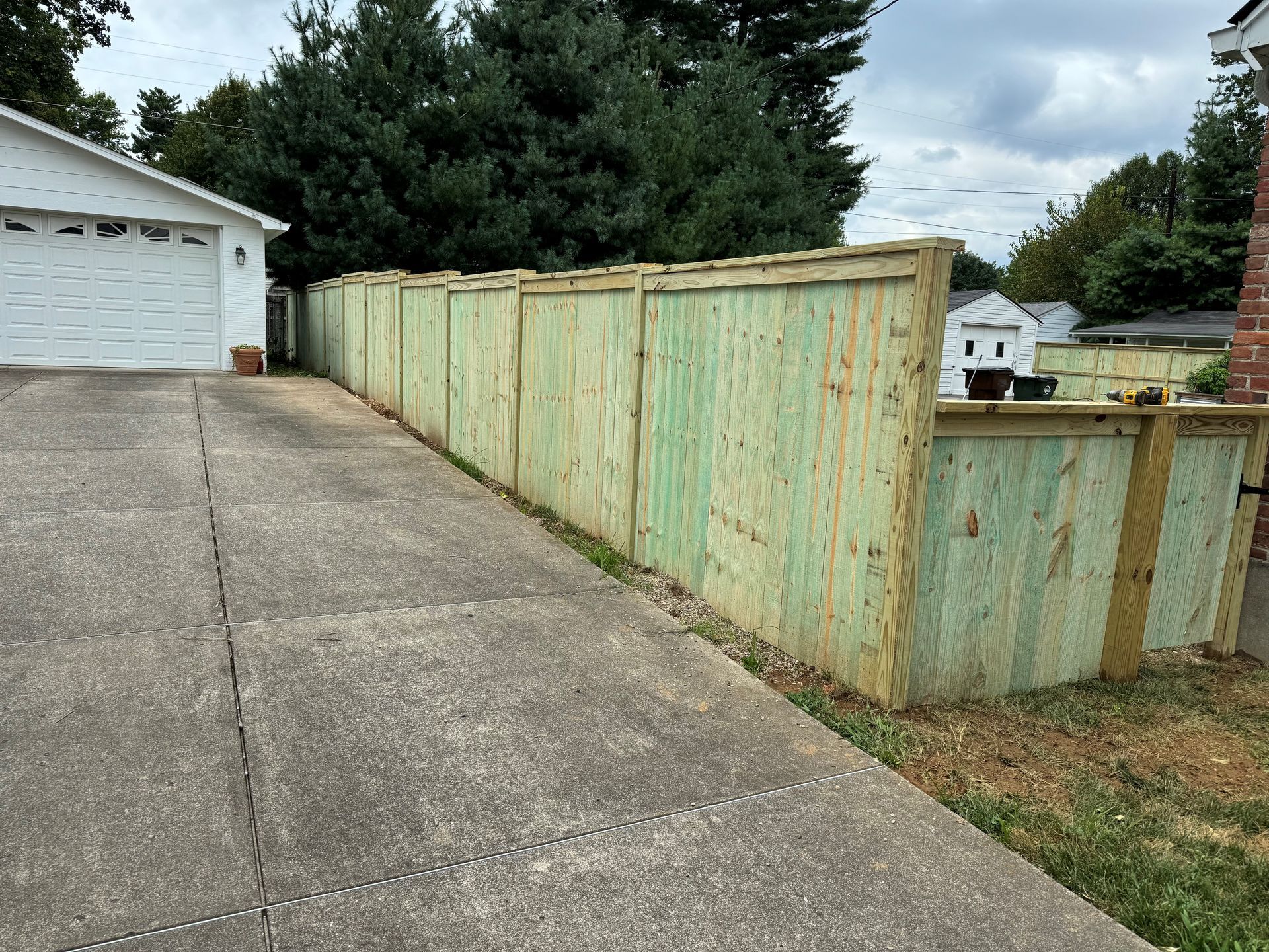 Fence Beside Garage Driveway — Louisville, KY — Shatkoff Fencing