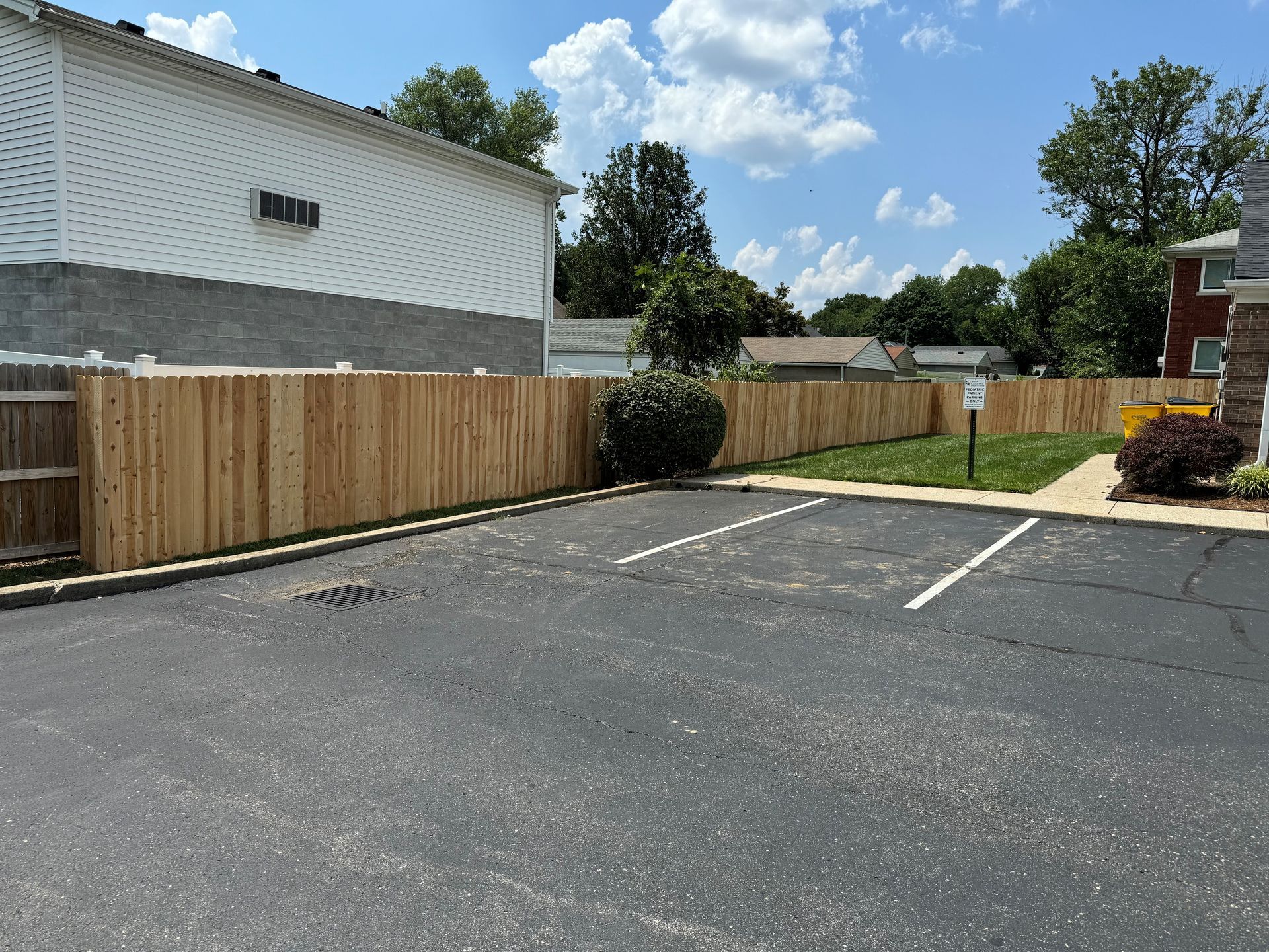 Parking Lot Wooden Fence — Louisville, KY — Shatkoff Fencing