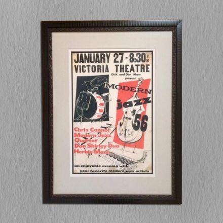 A framed poster for modern jazz at the victoria theatre