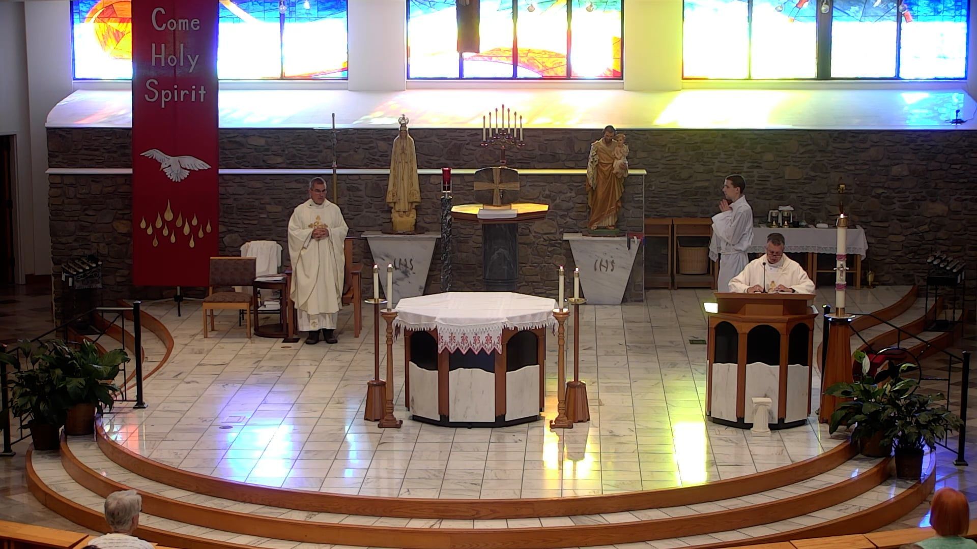 Deacon Leon and Fr. Pete at the altar in the main church
