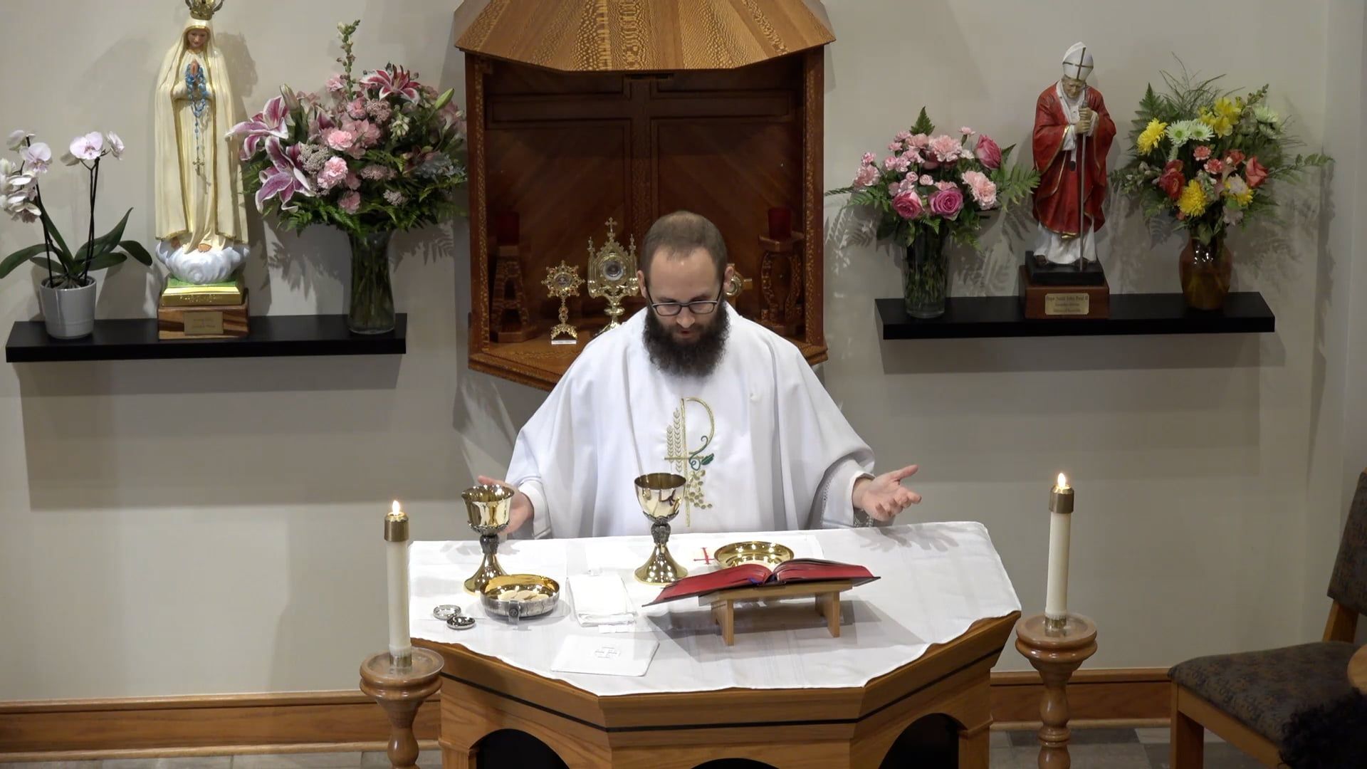 Fr. Joe at the altar in the chapel