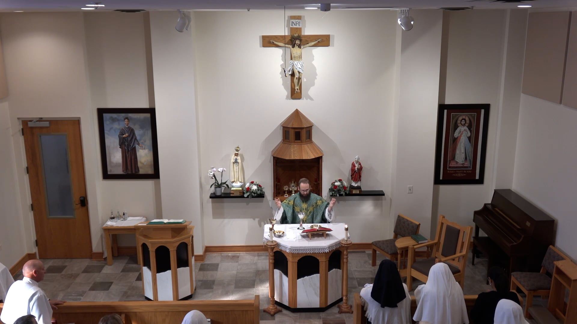 Father Joe celebrating mass in the chapel. 
