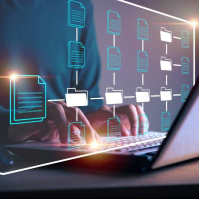 Person typing on a laptop with a digital illustration of files and folders overlayed, suggesting data organization.
