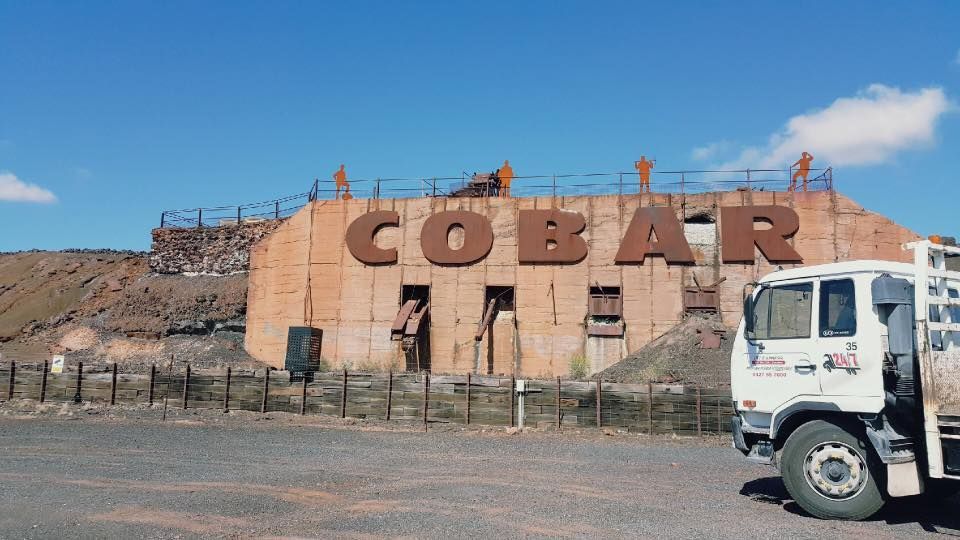 Truck is Parked in Front of a Building That Says Cobalt — Pit Express in Newcastle, NSW