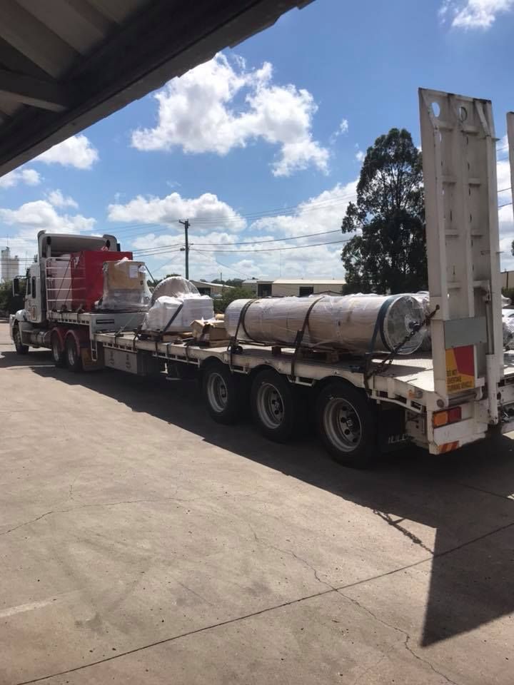 Semi Truck With a Flatbed Trailer is Parked in a Parking Lot — Pit Express in Welshpool, WA