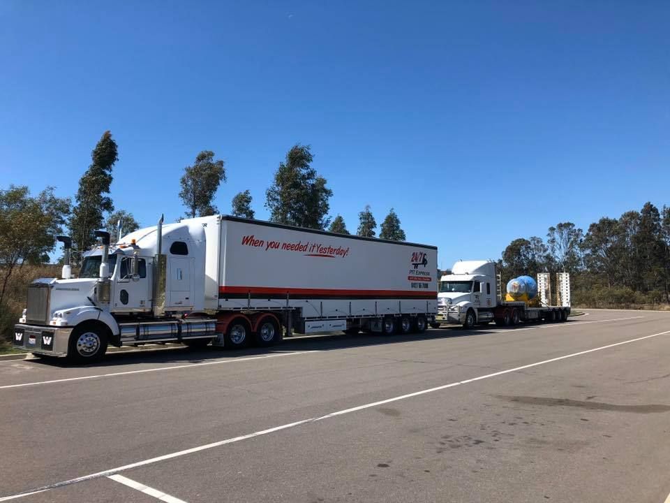 Two Semi Trucks Are Parked on the Side of the Road — Pit Express in Tamworth, NSW