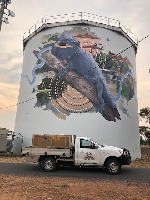 White Truck is Parked in Front of a Large Mural on a Wall — Pit Express in Maitland, NSW