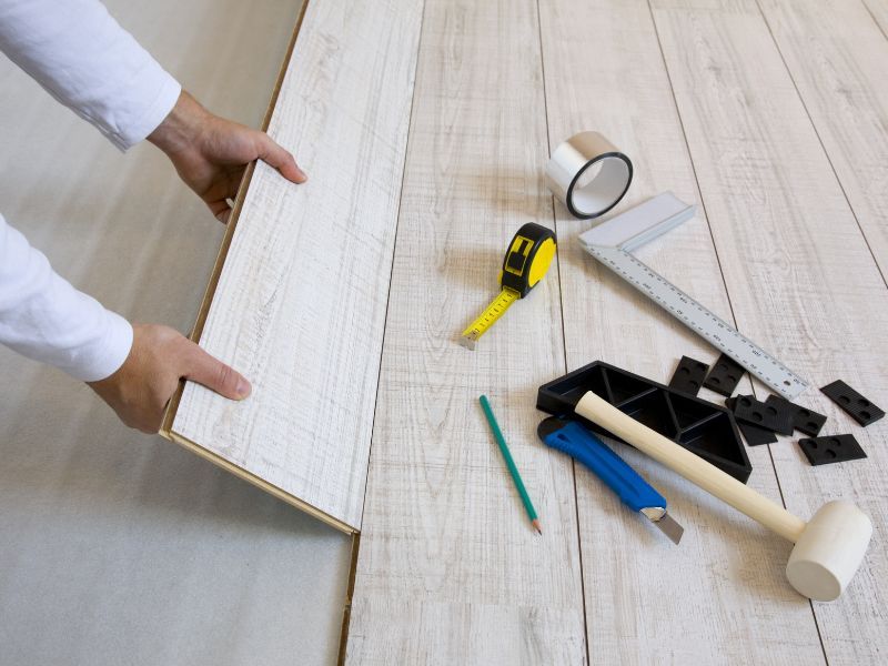 Measuring and preparing light wood flooring for installation – Gulf of America Flooring, Spring Hill FL.