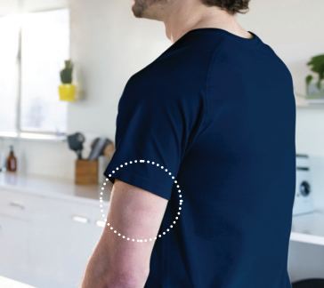 A man in a blue shirt has a circle around his elbow