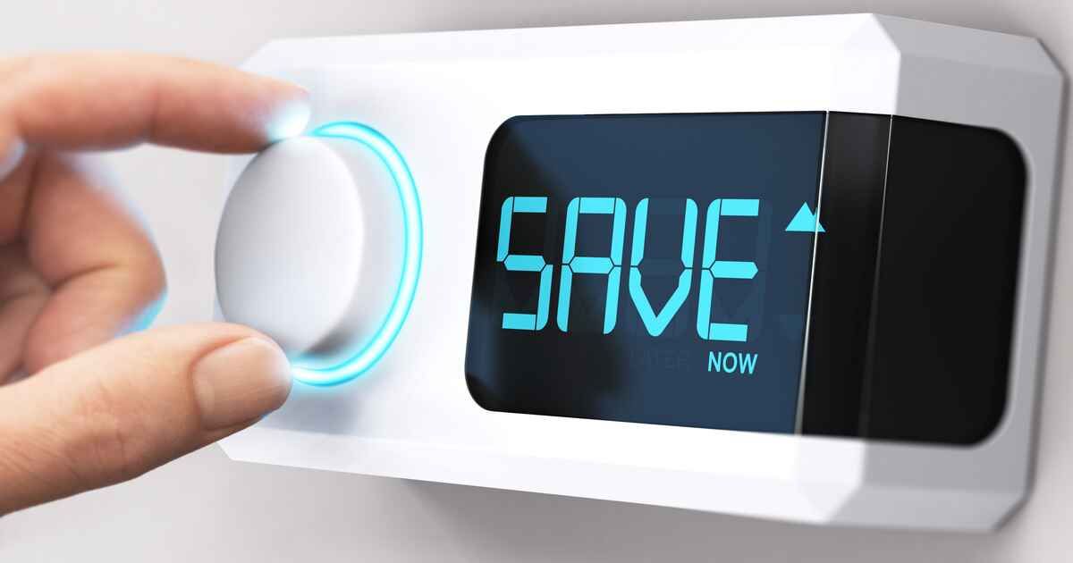 A person is pressing a button that says save on it.