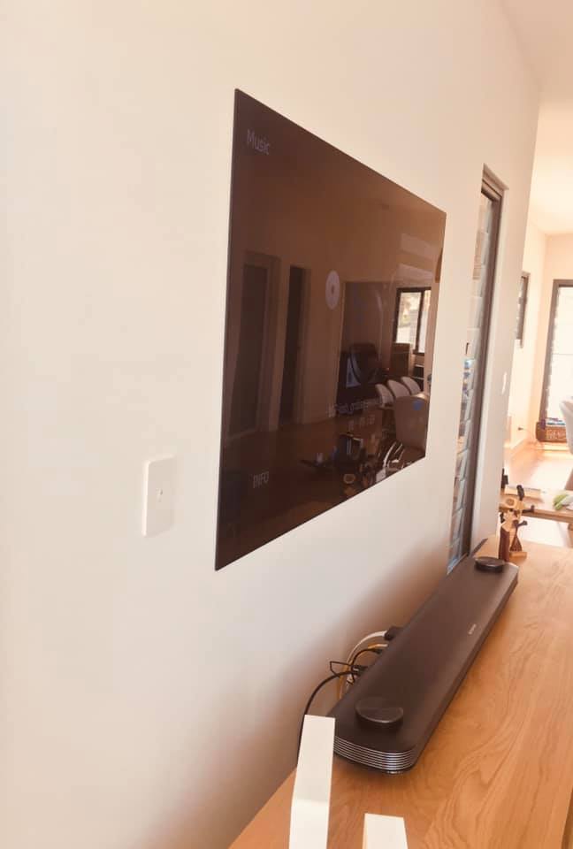 TV Wall Mounted On White Wall — Shane Kelly Communications In Lennox Head, NSW