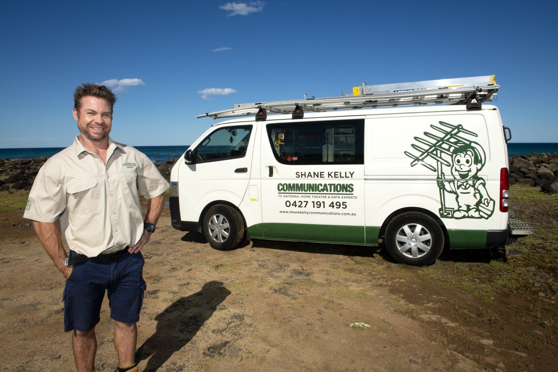 Jason posing in front of work van — Shane Kelly Communications In Lennox Head, NSW