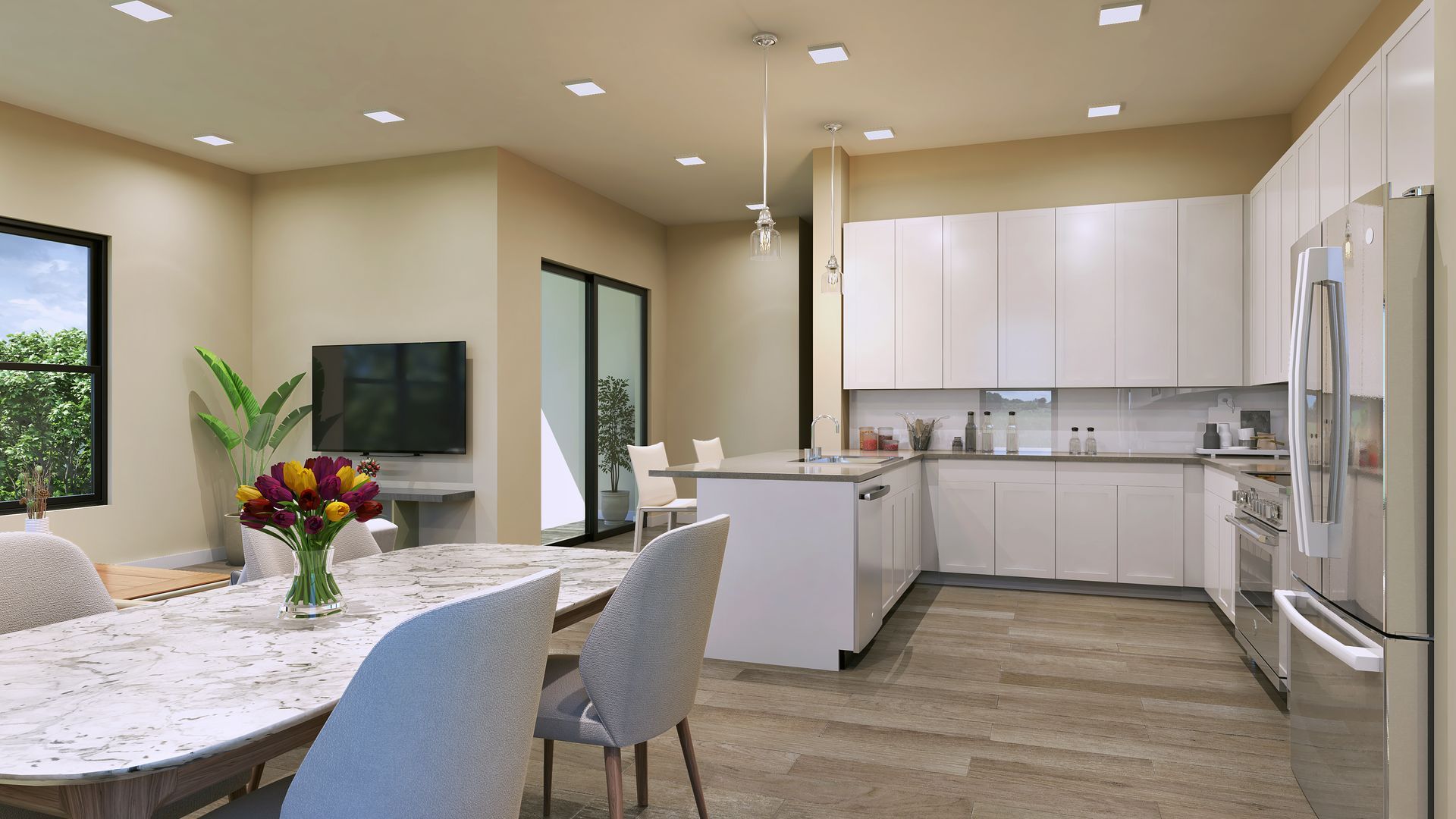 Modern open-concept kitchen and dining area with white cabinetry, island, and dining table with large windows.