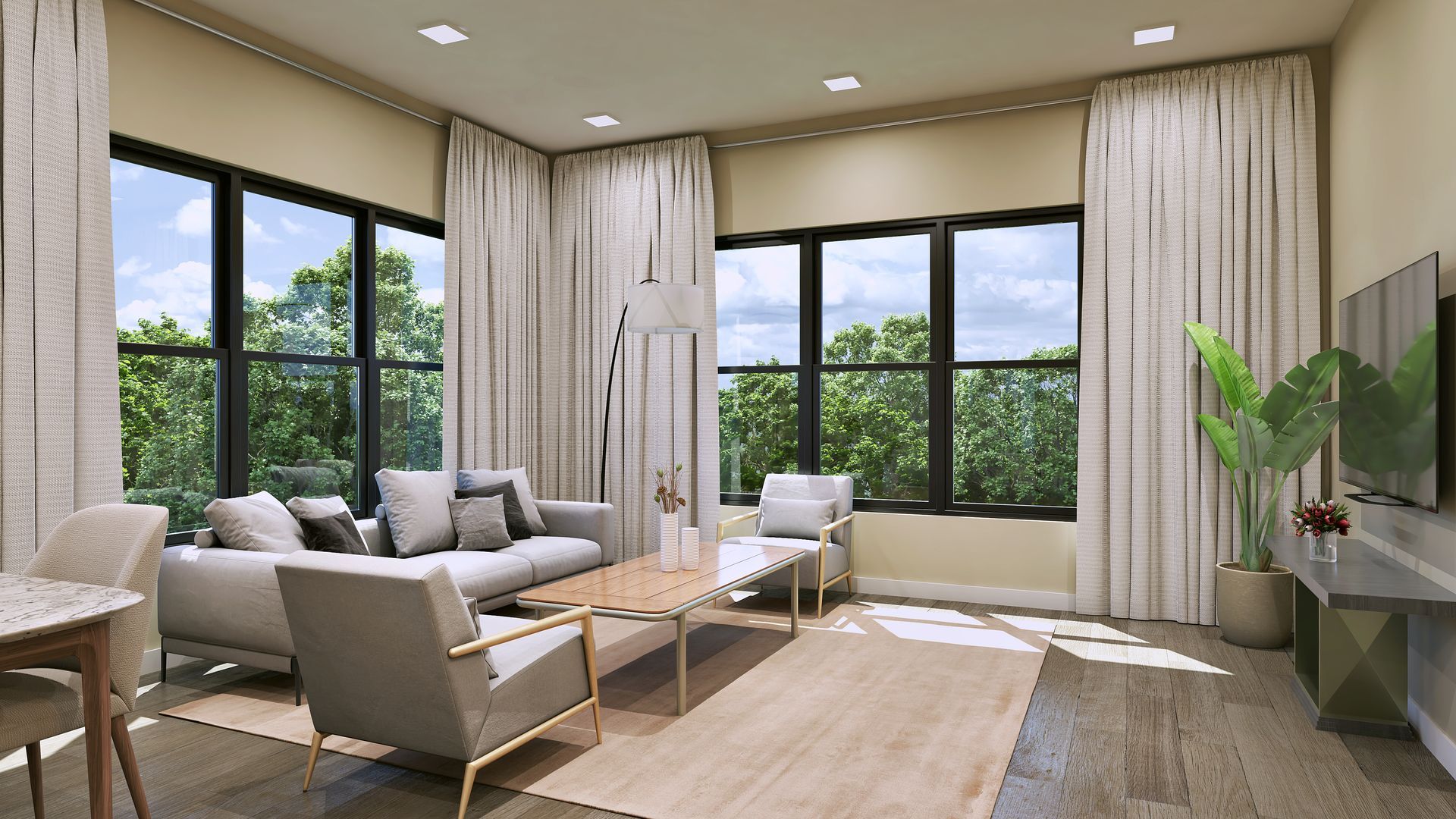Living room with light-colored walls, large windows, light gray couch and chairs, and a coffee table.
