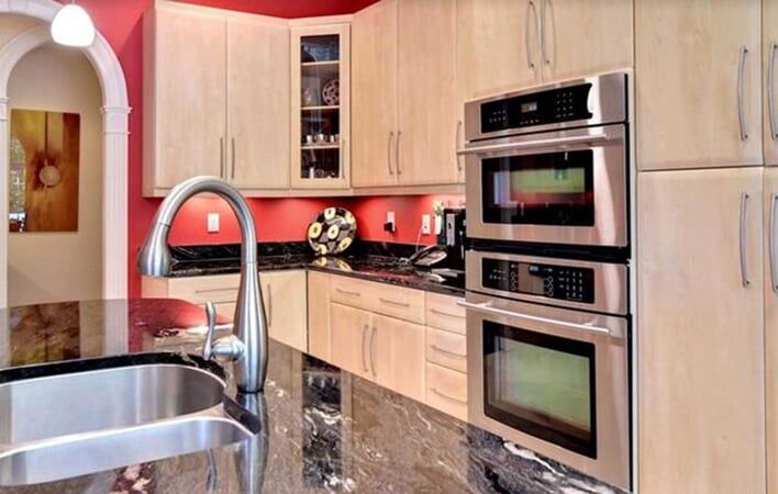 Kitchen with Red Back Painting — Chesapeake, VA — All In Builders