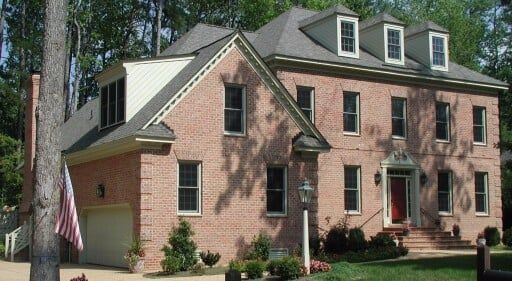 Brick House with American Flag — Chesapeake, VA — All In Builders