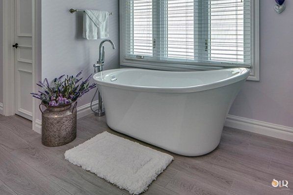 Bathroom White Bathtub and White Carpet — Chesapeake, VA — All In Builders
