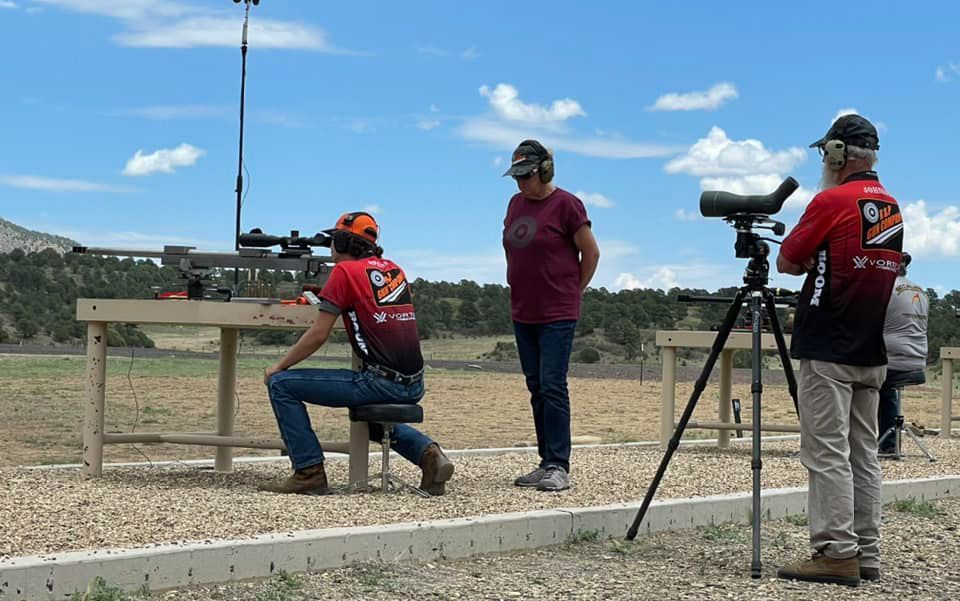 Three men in a shooting game