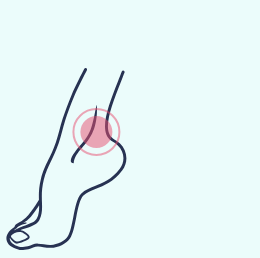 A drawing of a foot with a pink circle around it.