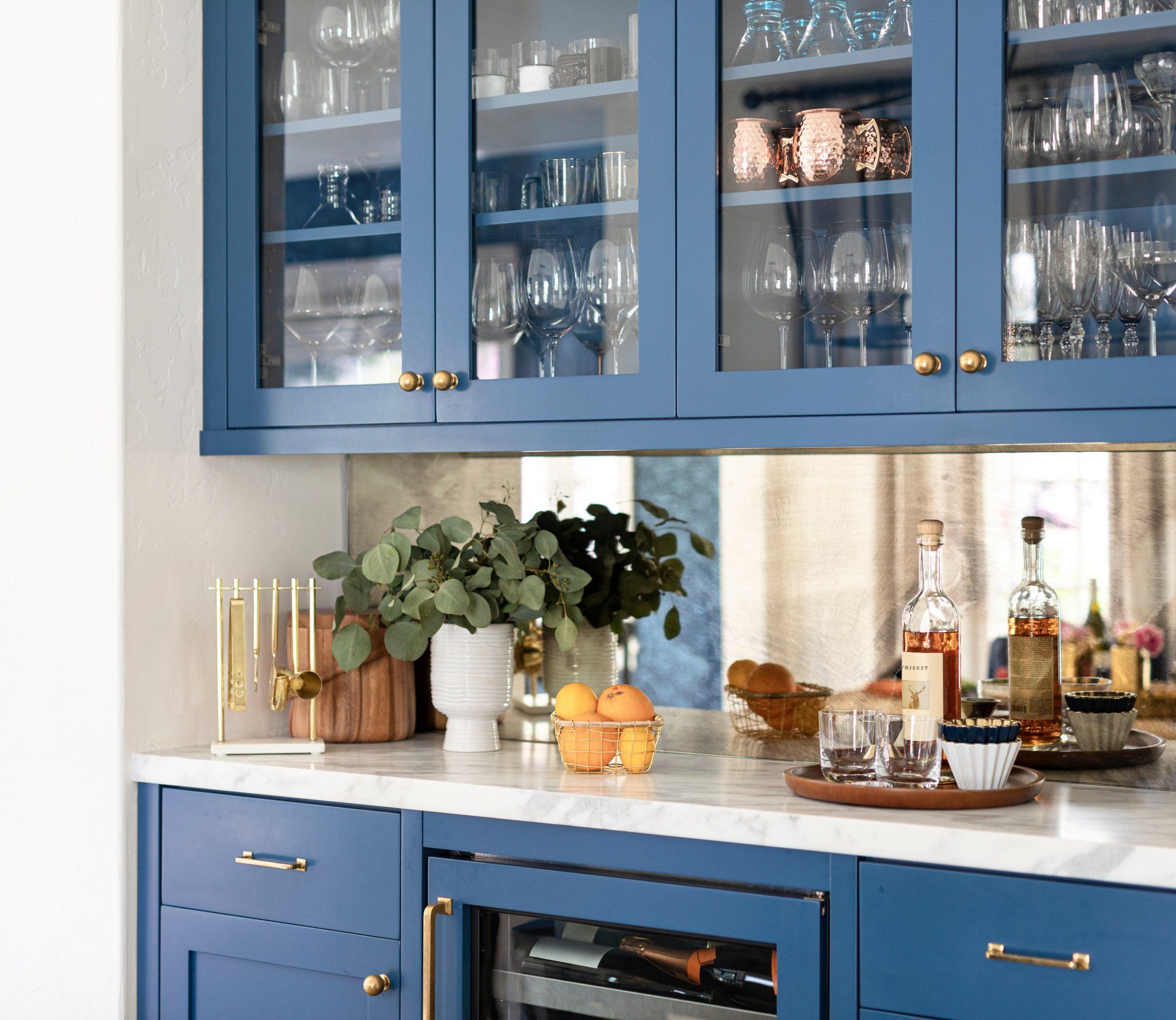 Custom painted dining room side bar cabinets with a blue finish