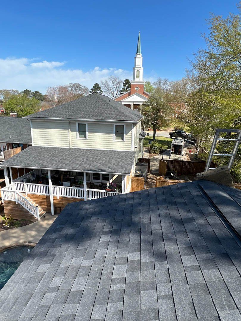 A view of a house from the top of a roof.